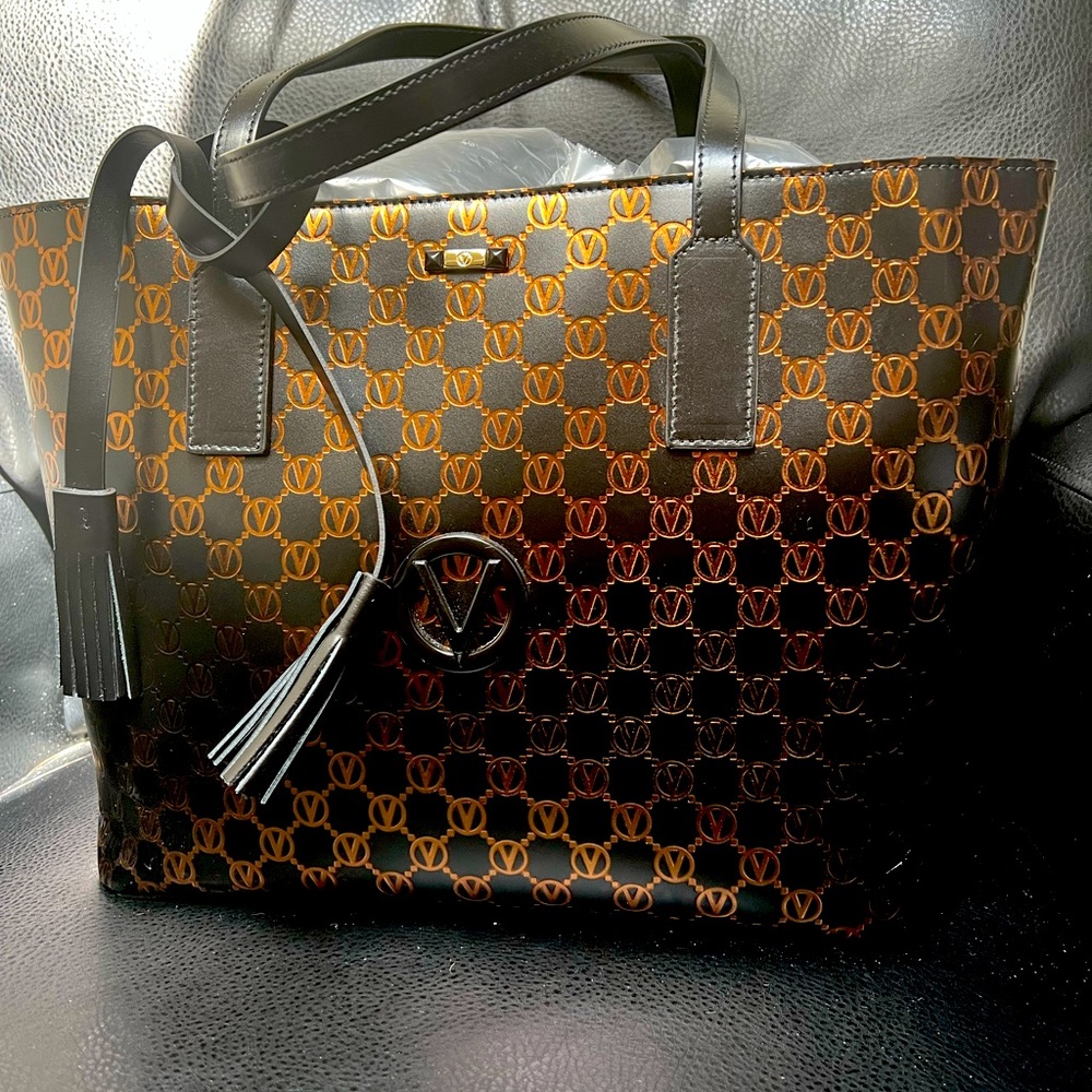 Gorgeous New Valentino leather bag. Black with bronze accents.